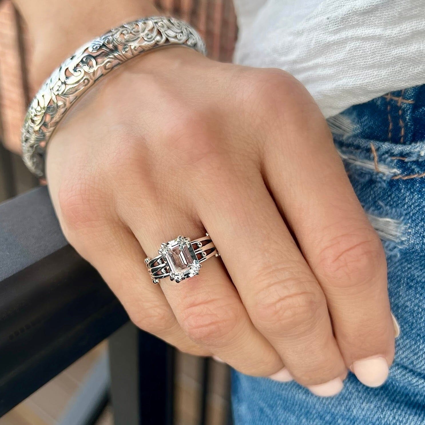 emerald cut white topaz stone prong-set in handcrafted sterling silver