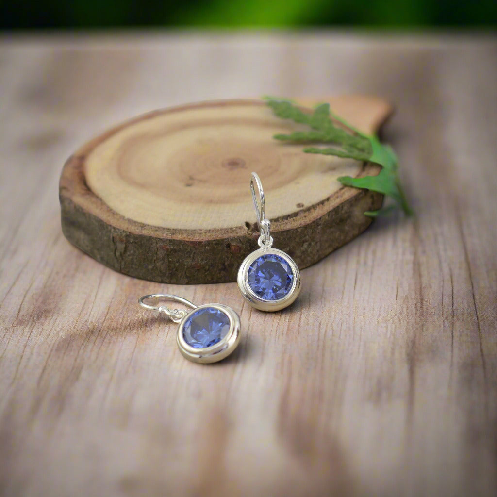 Handcrafted sterling silver earrrings featuring Tanzanite Blue CZ stones