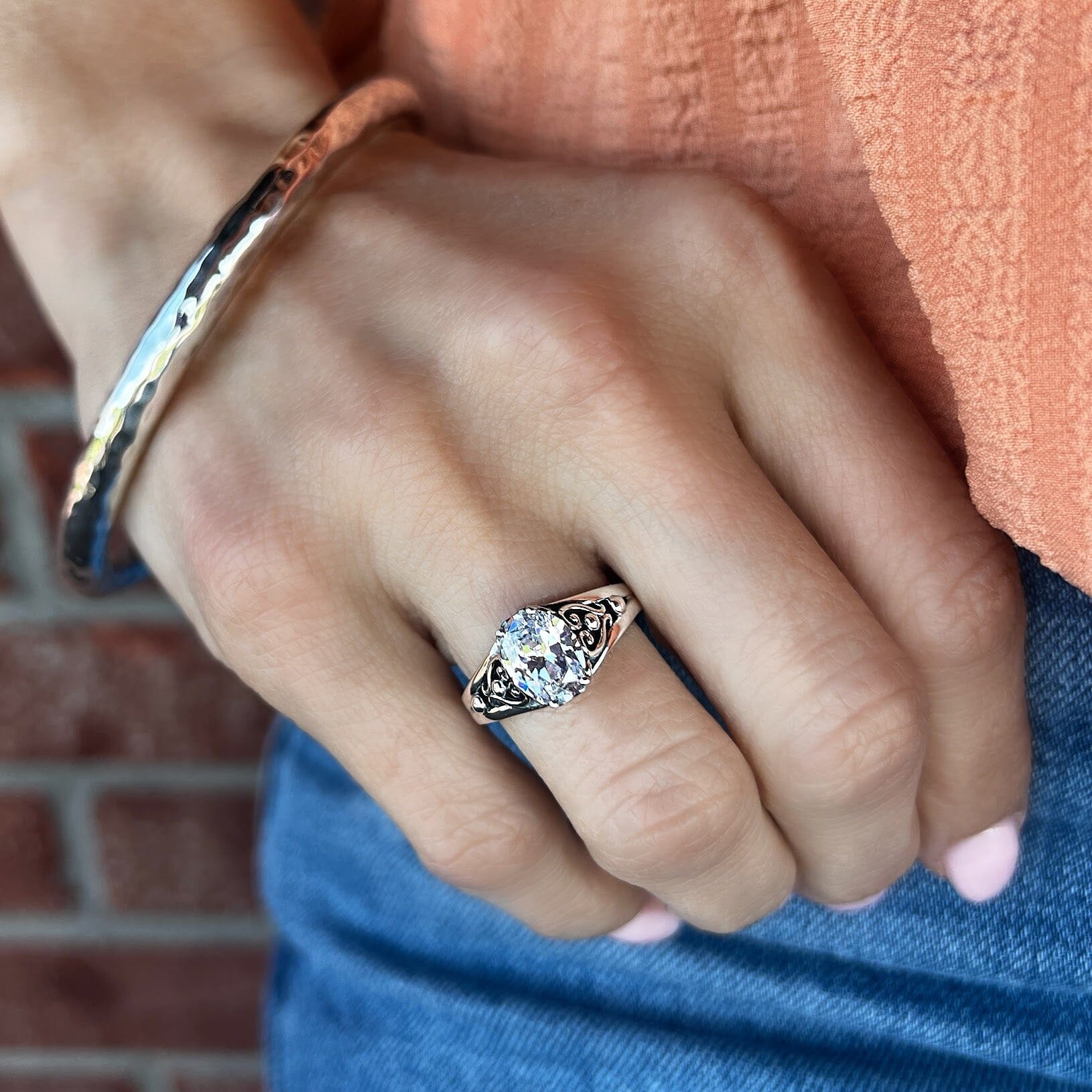 minimalist style prong set oval cz in sterling silver