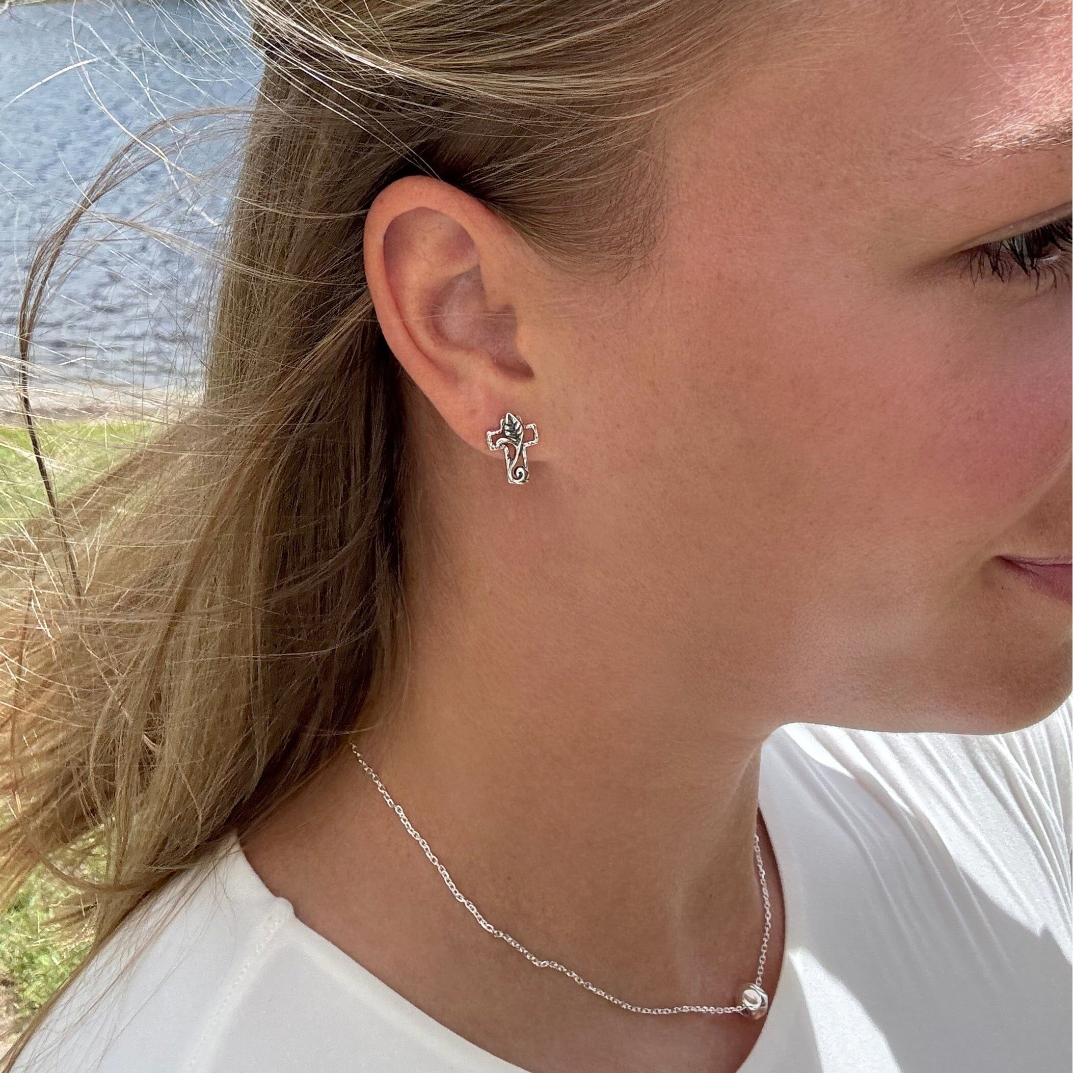 Christian sterling silver cross earrings with an organic old-world design