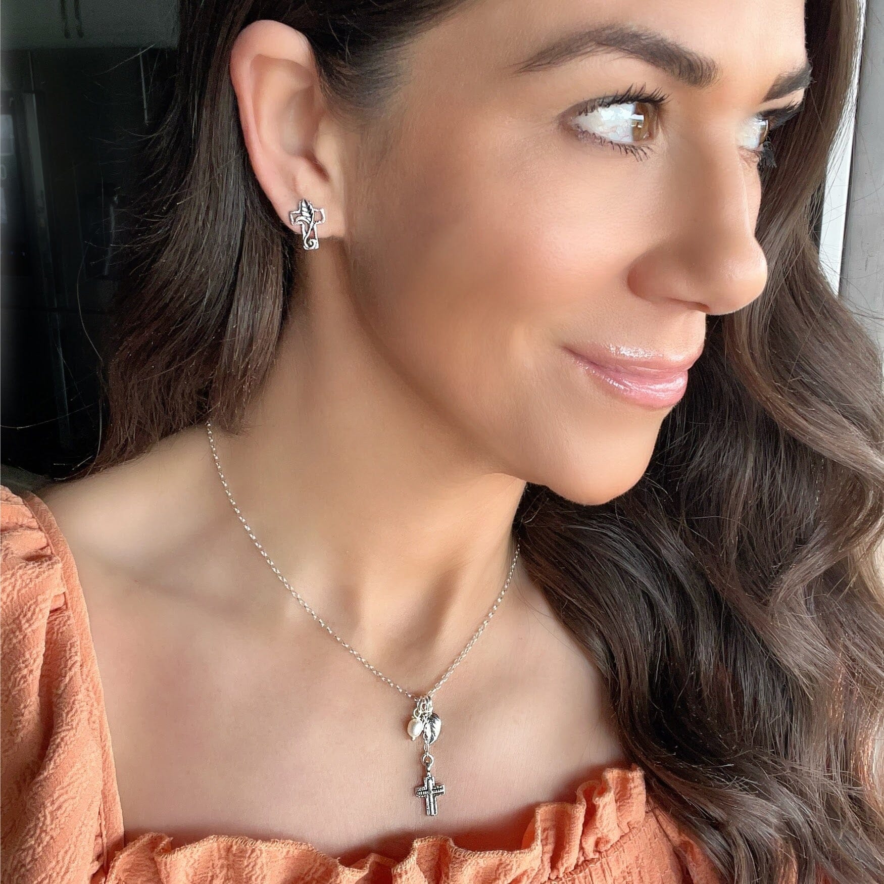 Matching New Life Earrings and Necklace featuring an organic leaf design with a cross