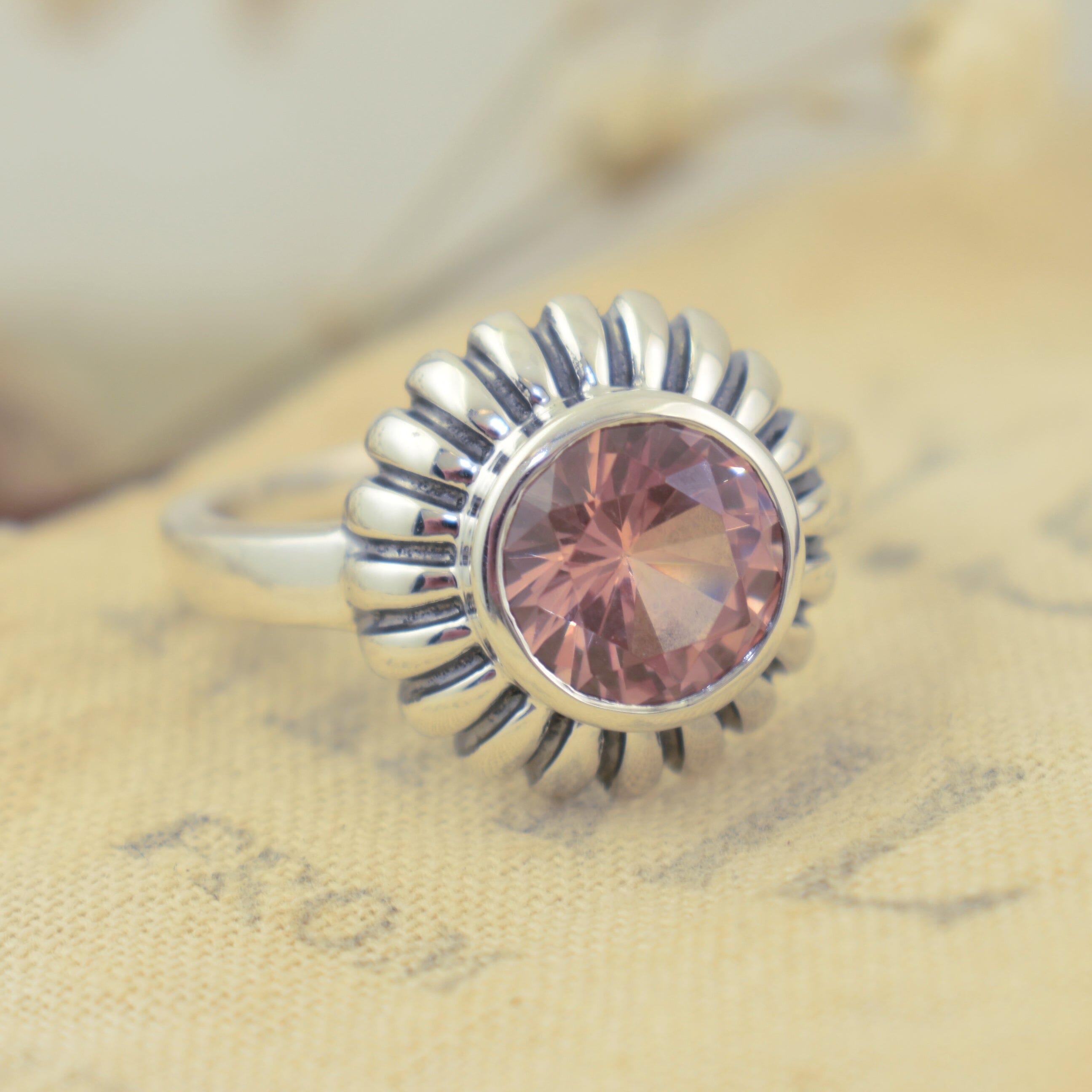 .925 sterling silver ring featuring round peach morganite stone
