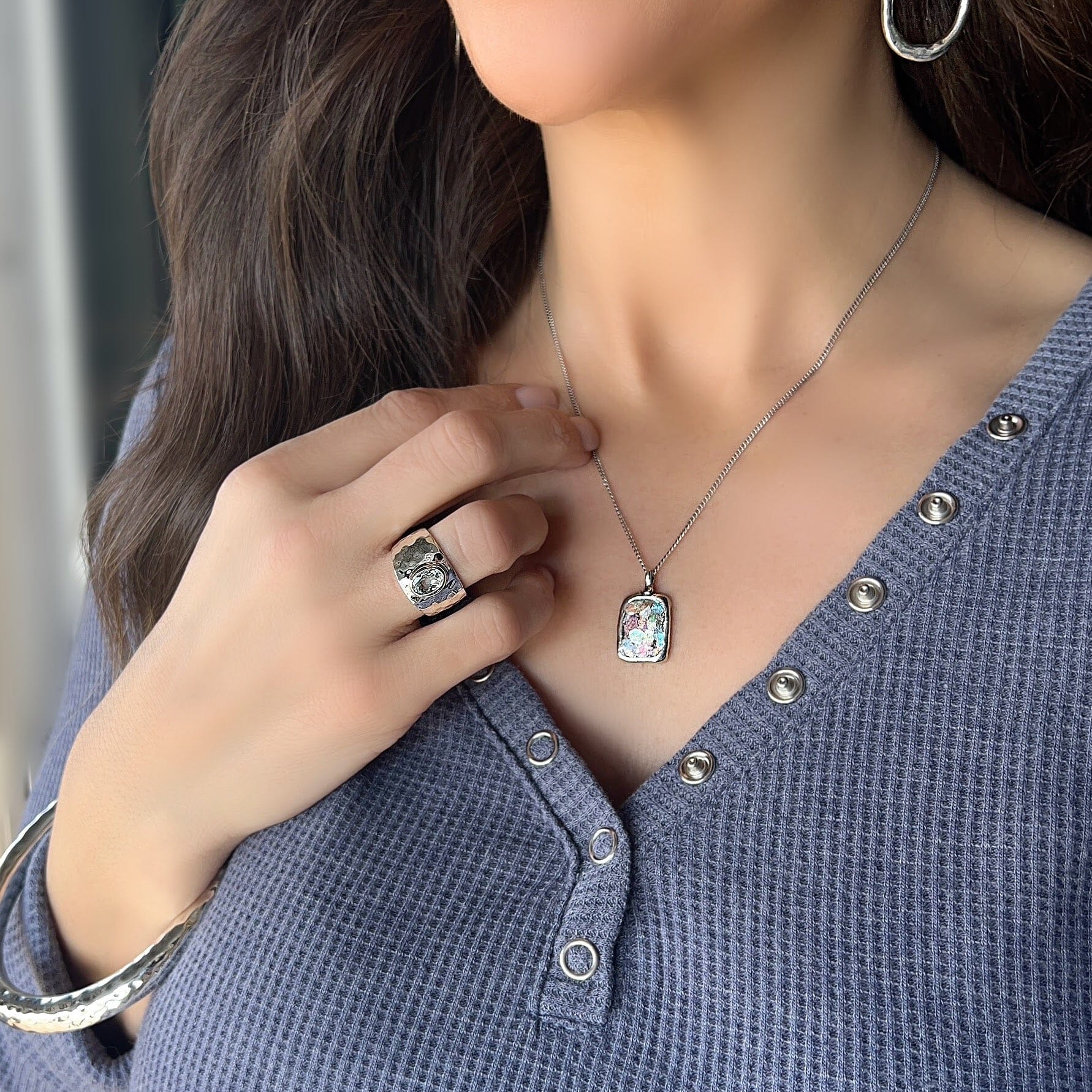 sterling silver necklace featuring genuine roman glass paired with the hammered bliss bangle and right as rain ring