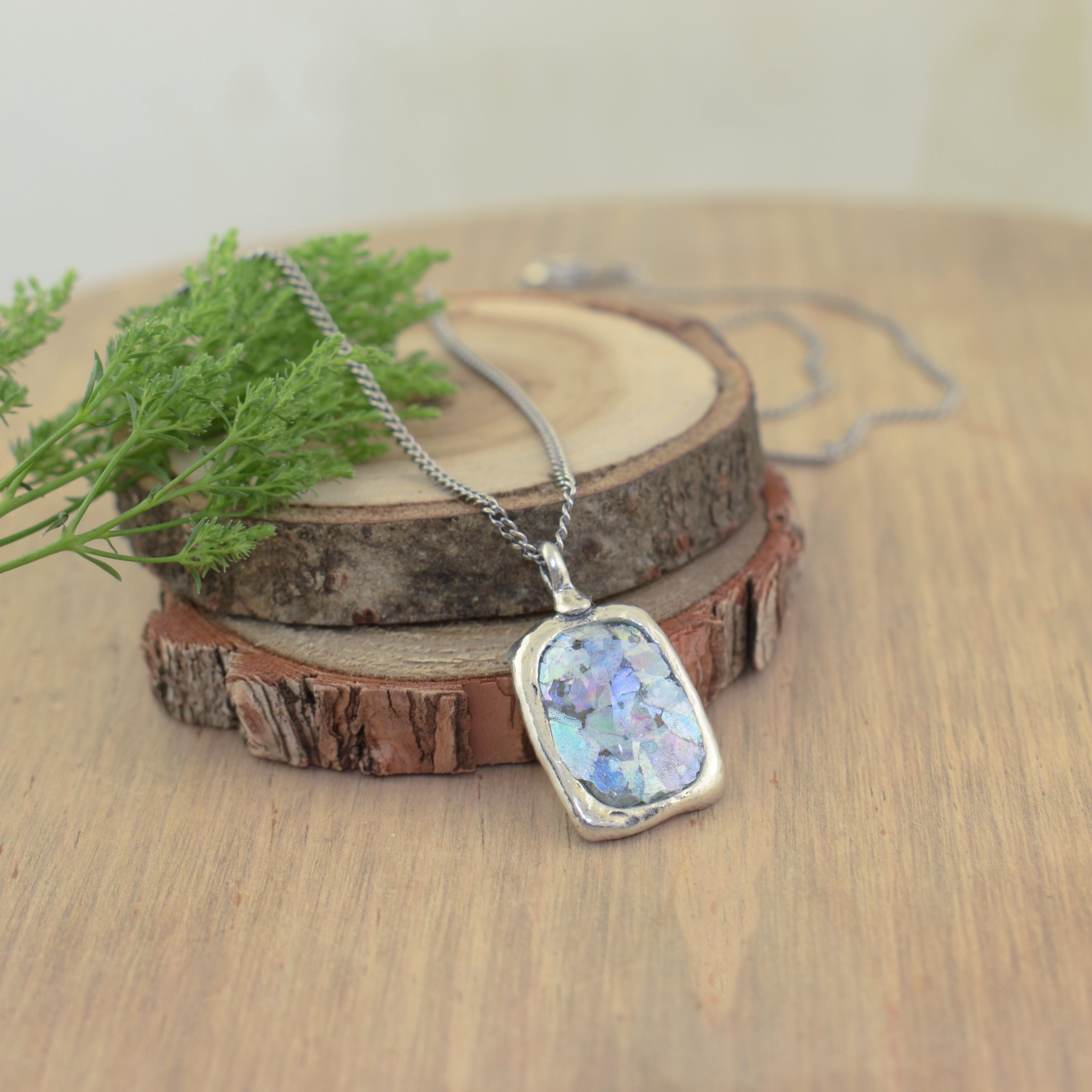 oxidized sterling silver chain featuring a high polished rectangular pendant bezel set with genuine roman glass