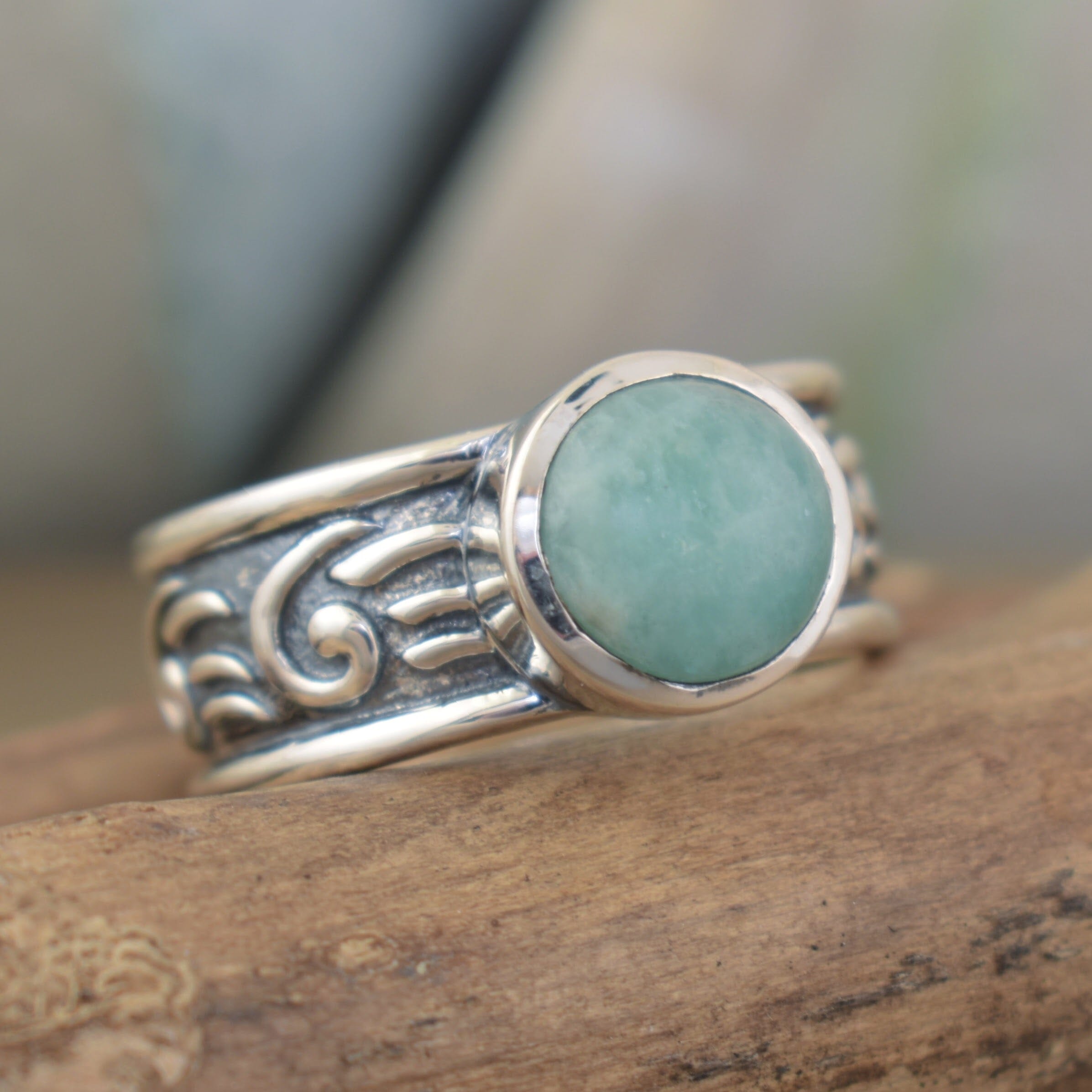 unique silver designer ring featuring a bezel set amazonite center
