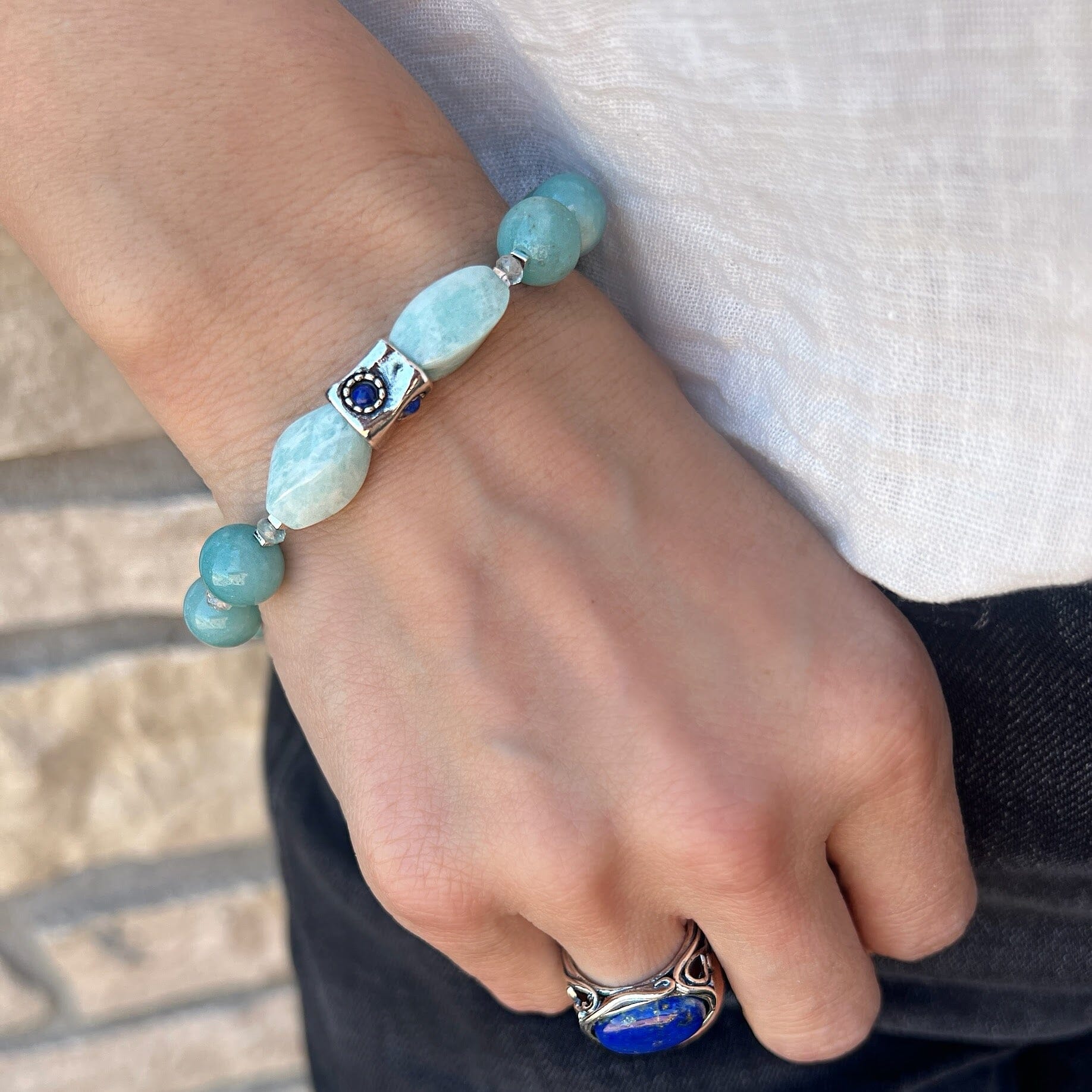 chunky beaded stretch bracelet featuring a silver bead with lapis stones