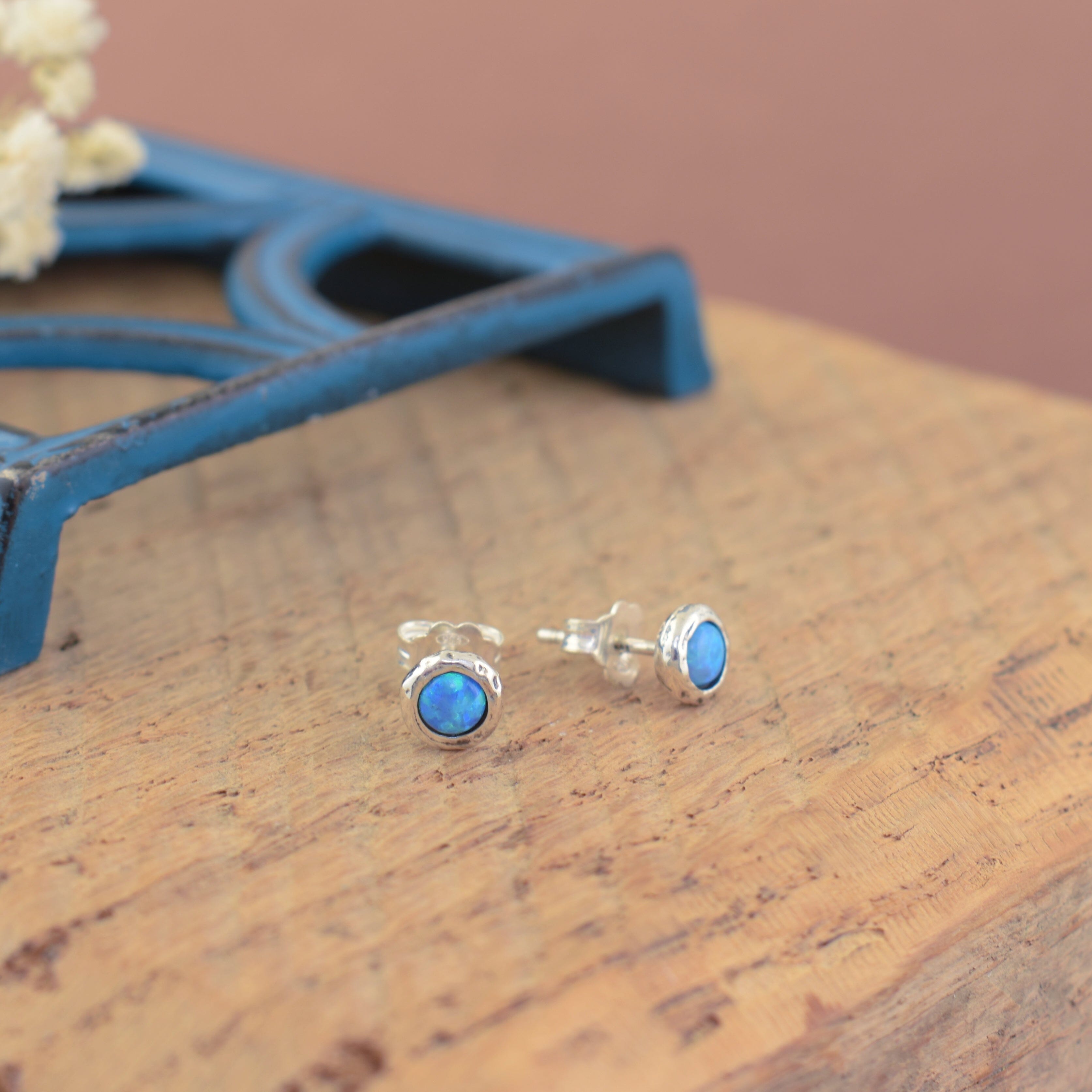 Sterling silver push back post style earrings with reconstructed opals