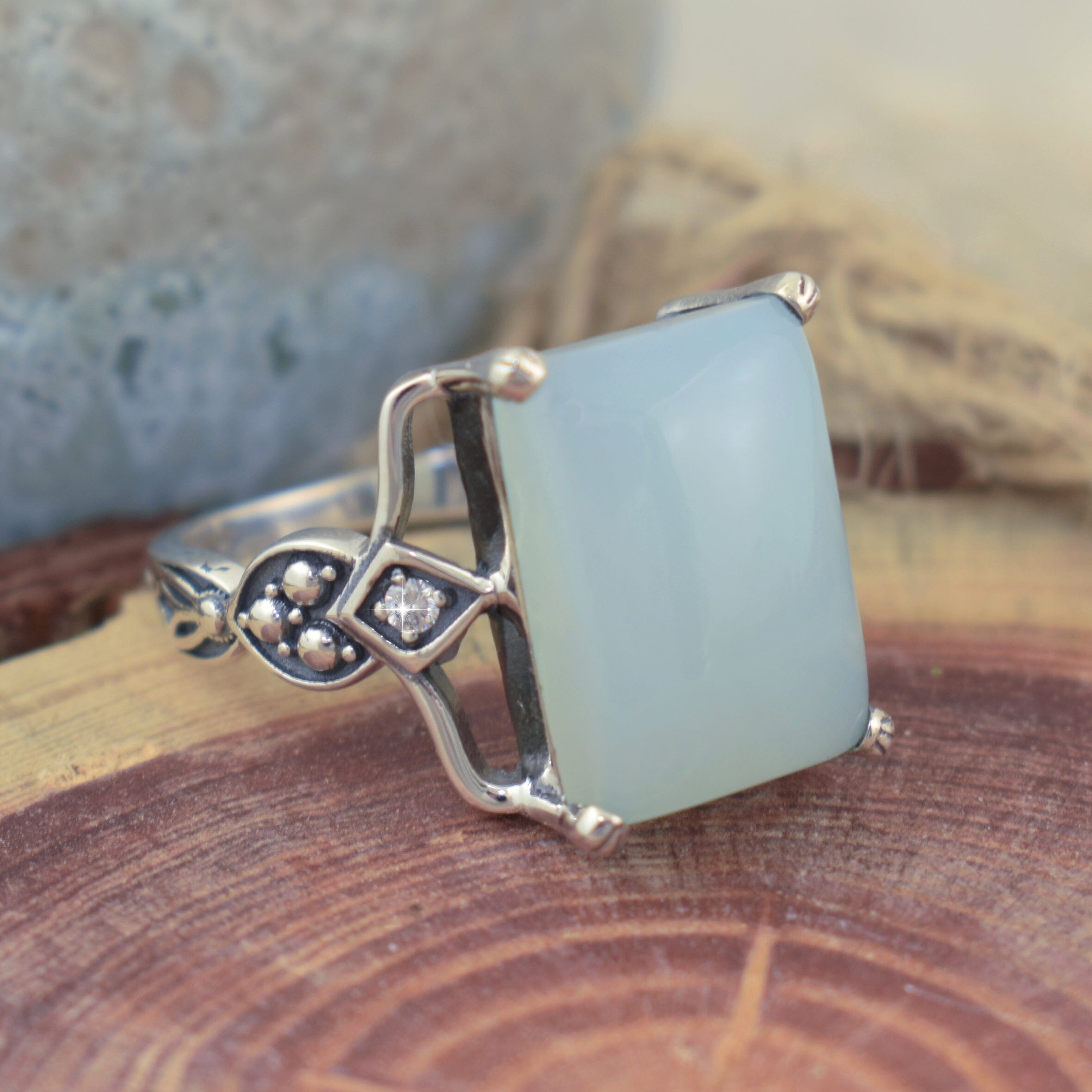 .925 sterling silver statement ring featuring large aqua green chalcedony stone