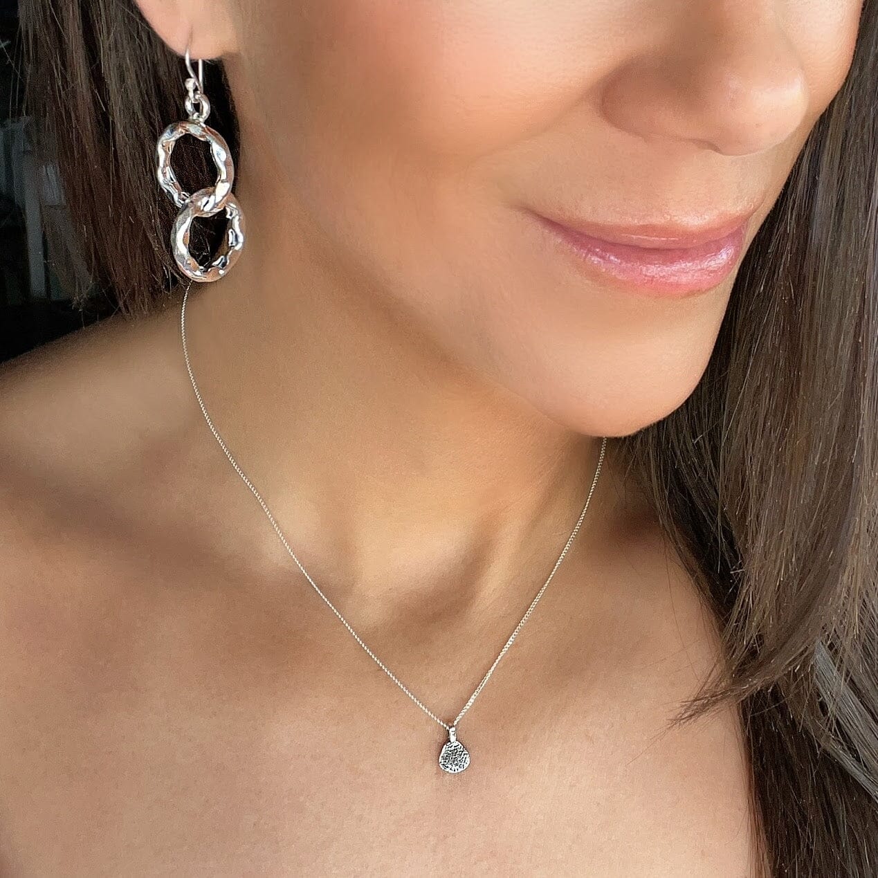 dainty hammered pendant on a delicate sterling silver chain