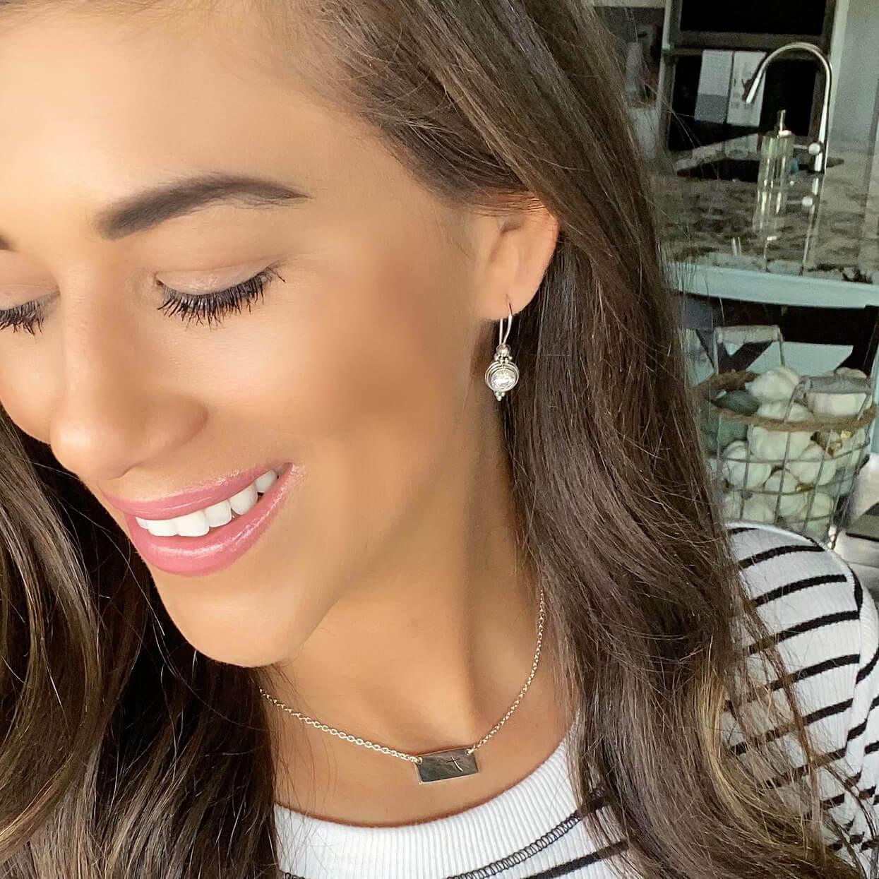 Sterling silver french back earrings with cz