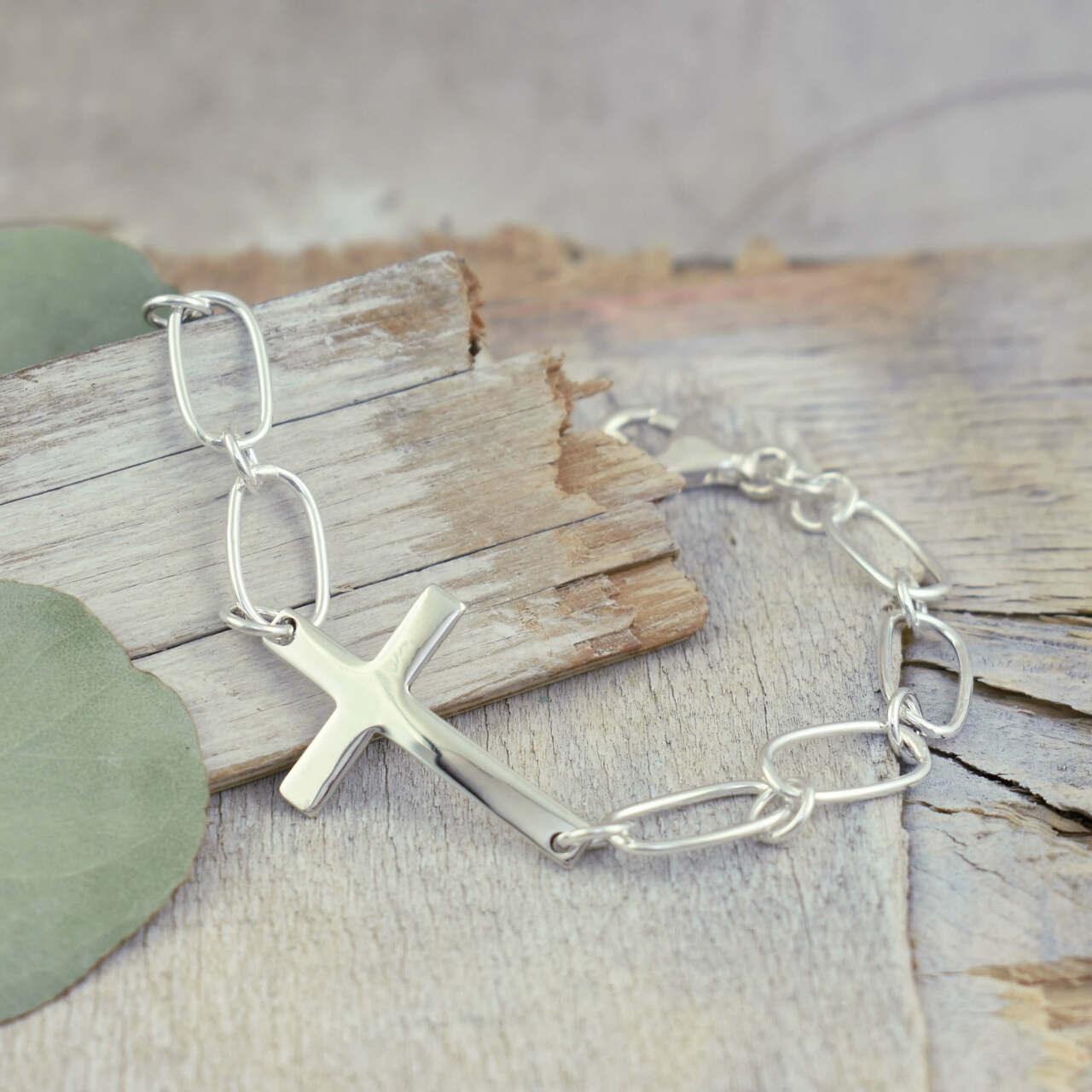 Handcrafted sterling silver link bracelet with cross