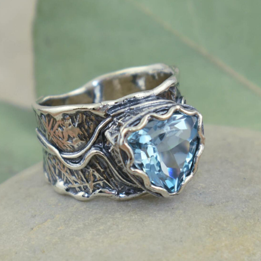 .925 sterling silver ring with light blue stone
