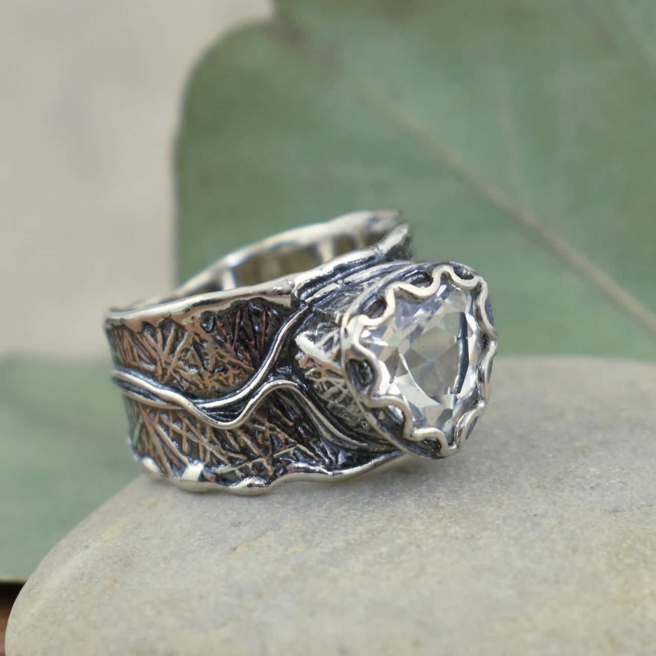 .925 sterling silver ring featuring white topaz