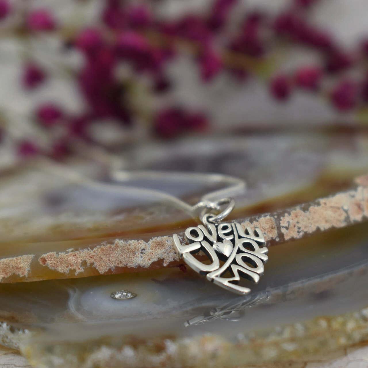 Handcrafted sterling silver pendant on 16" chain 