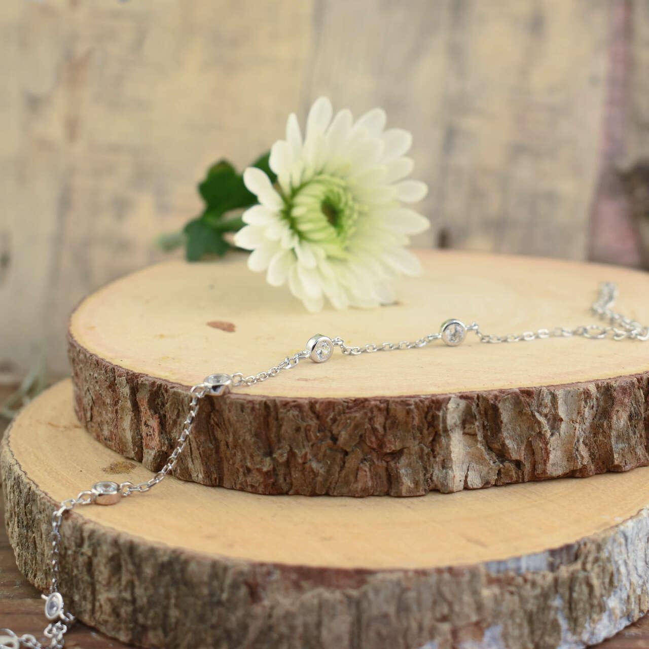 Handcrafted sterling silver bracelet with round cubic zirconia