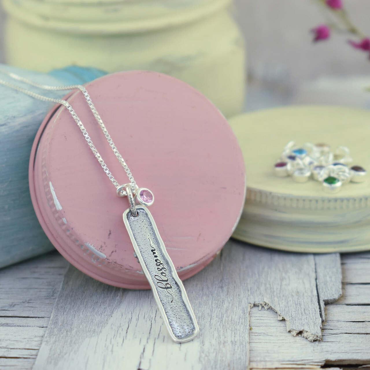 Handcrafted necklace with sterling silver pendant and CZ birthstone